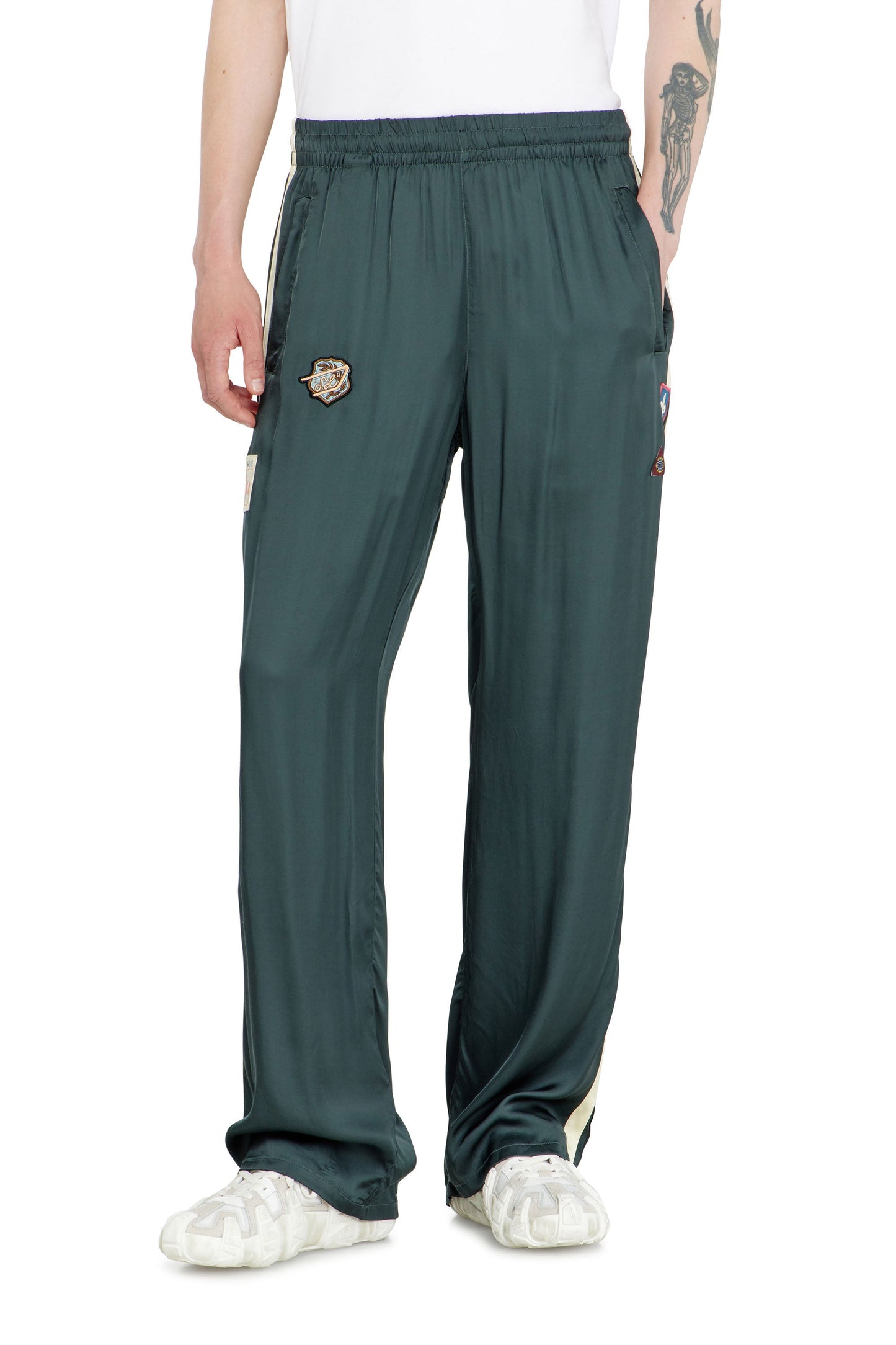 Satin track pants with patches